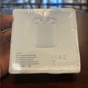 Apple AirPods with Wireless Charging Case - White